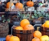 A batch of pumpkins outside on a Halloween display.