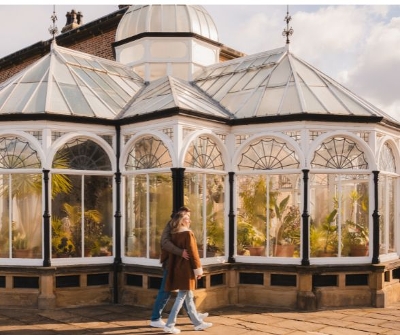 Couple walking outside the park hall
