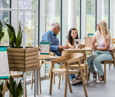 Family looking at the menu in the Spence cafe.