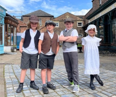 School children dressed-in Victorian clothing
