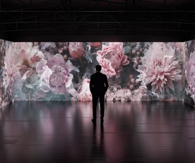 A visitor looking at Perfume by Yann