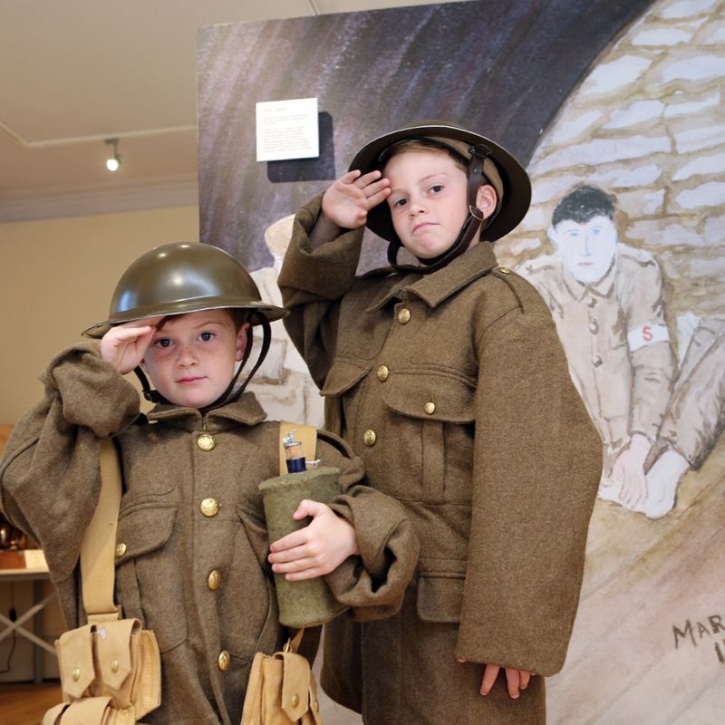 Two Boys Dressed As Soldiers
