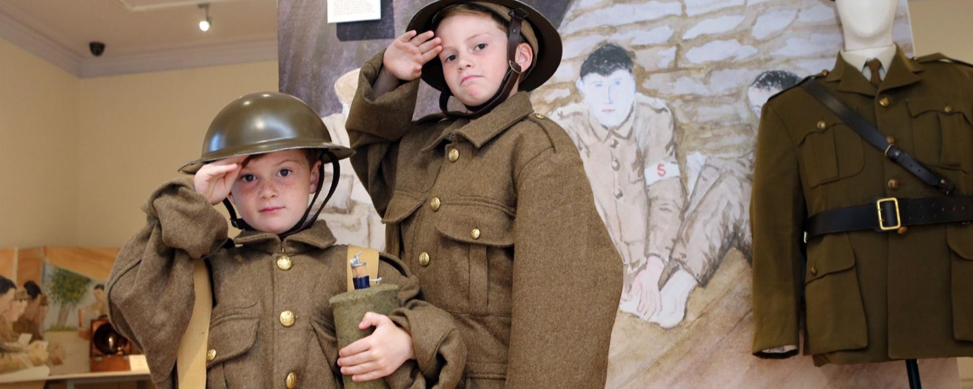 Two Boys Dressed As Soldiers