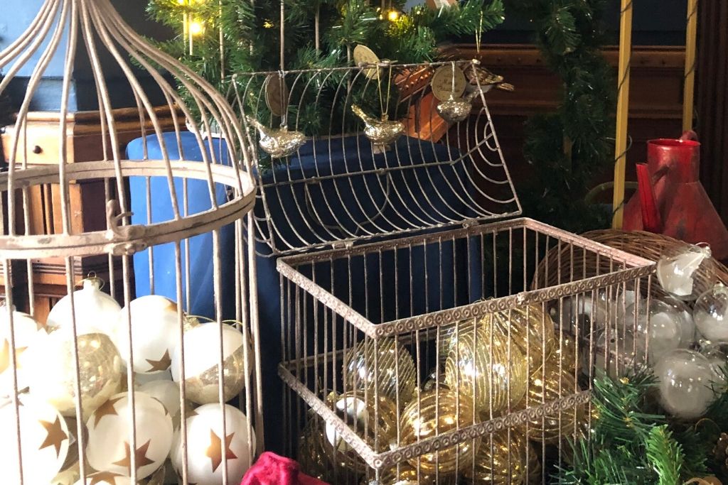 Gold And White Baubles In A Cage