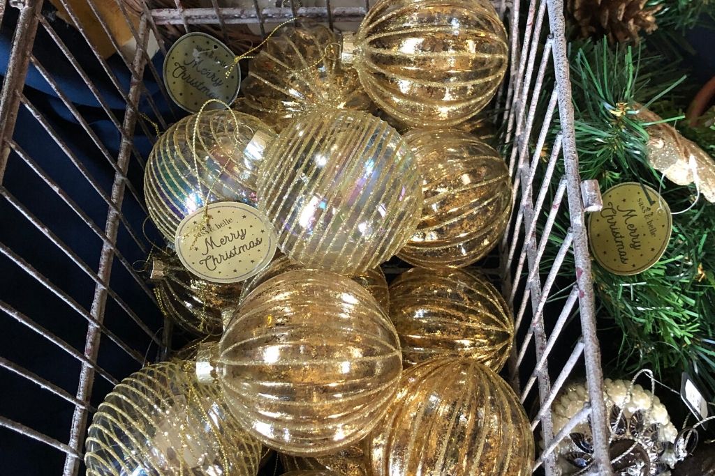 Gold Baubles In A Bird Cage