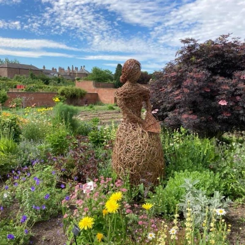 Willow Sculpture Of Lucy Judson In The Walled Garden At Preston Park Museum