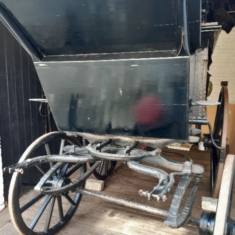 Dusty Victorian hearse before being cleaned