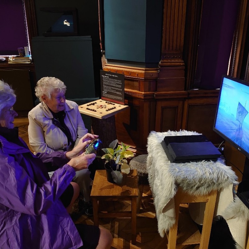 Visitors trying out the Discovery Tour game at Preston Park Museum