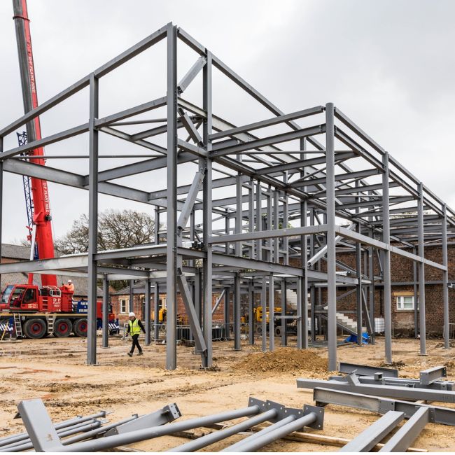 The steel frame structure of the new museum extension has been erected